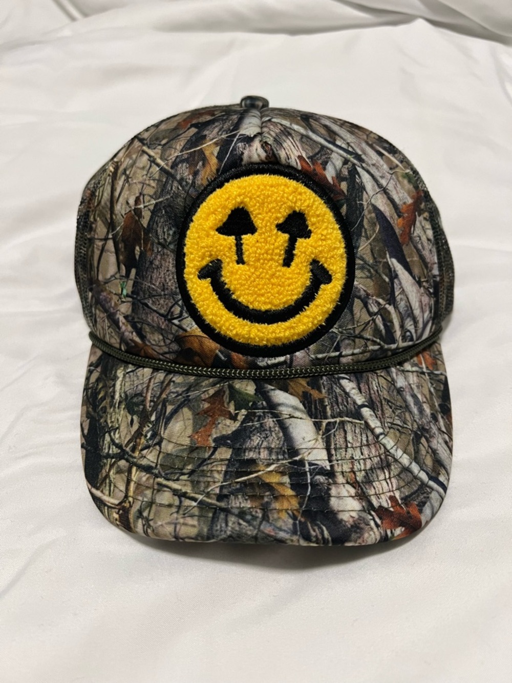Trippy happy face Camo Trucker Hat new with tags